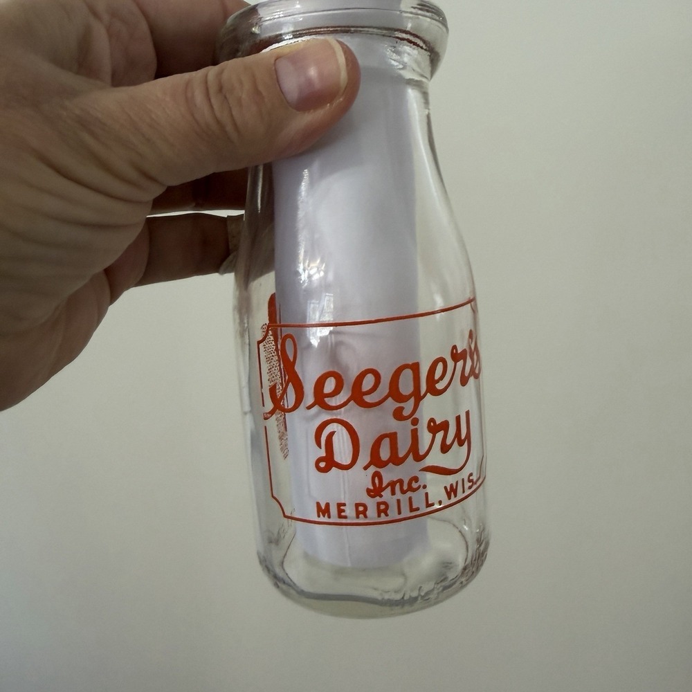 Seeger's Dairy Inc. Merrill Wi. ½ Pint Milk Bottle "A Dairy Guild Member" 1952
